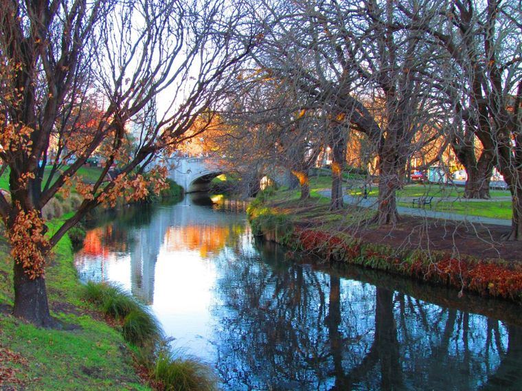The Avon River lined with autumn trees in Christchurch