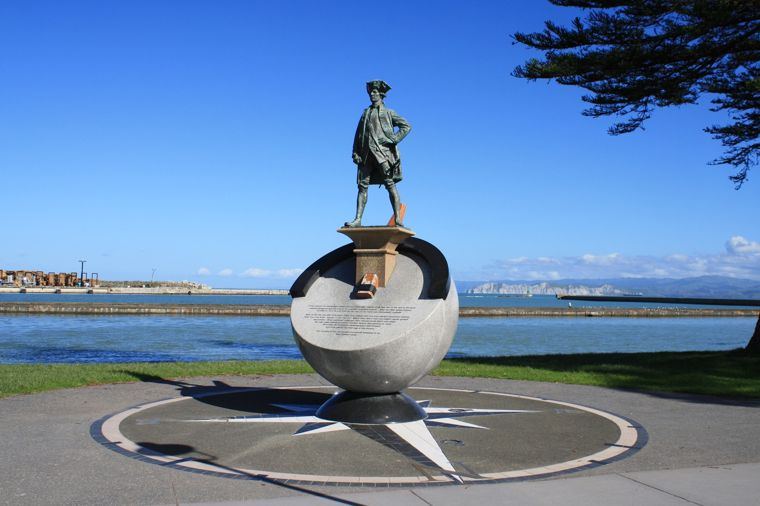 A statue on a globe on the Gisborne waterfront