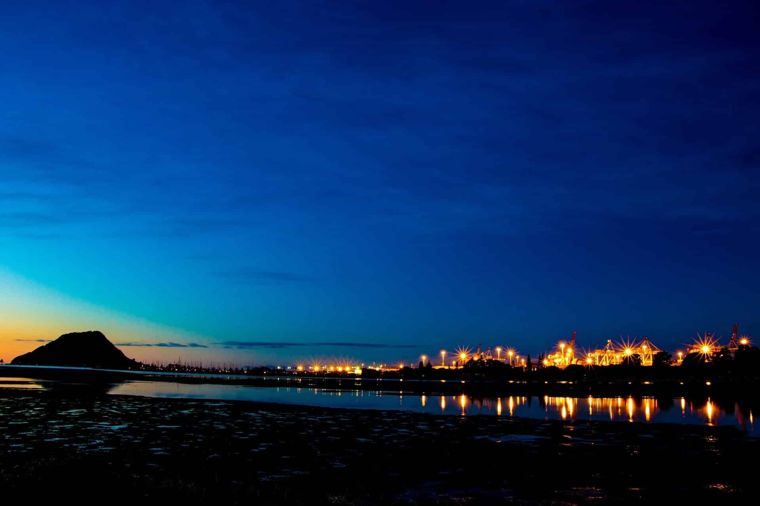 Mount Maunganui and harbour lights at dusk, Tauranga